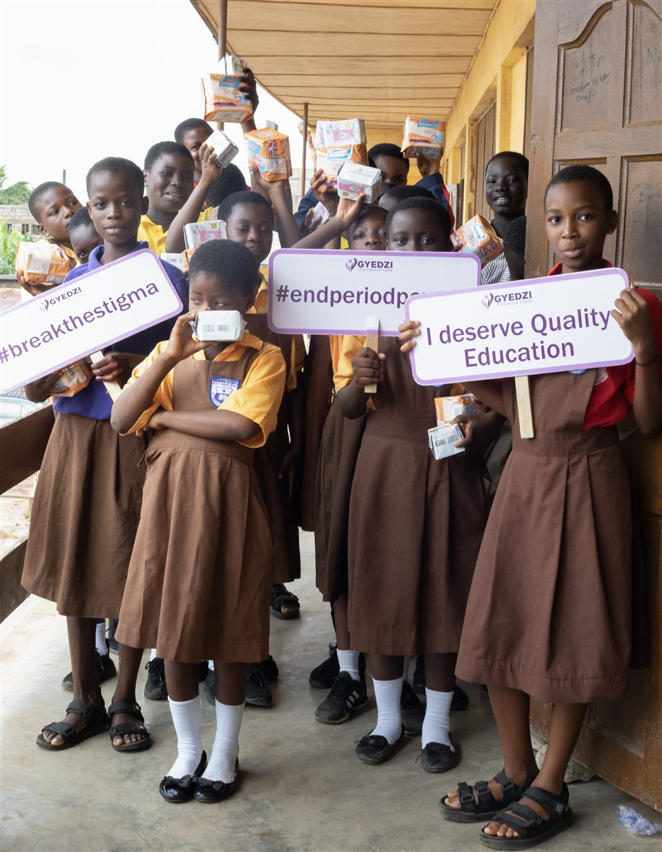 Students holding signs reading I deserve Quality Education and break the stigma at a Wild Card Project drive